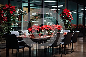 a dining table with poinsettia plants on