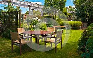 Dining Table set in Lush Landscaped Garden
