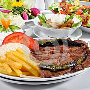 Dining table and traditional doner kebab in a luxury restaurant, Turkish traditional doner kebab