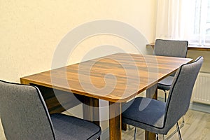 Dining table and upholstered chairs in the kitchen