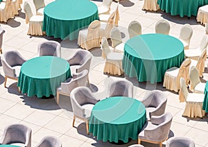 Dining tables on the restaurant`s outdoor terrace at the Kranevo hotel in Bulgaria