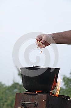 Dinner cooking on an open fire