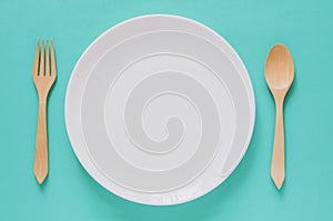 Dinner minimal background concept. Top view of empty white plate