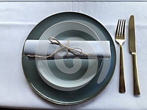 Dinner plate with napkin and cutlery