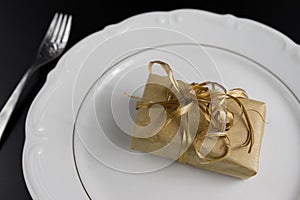 Dinner Setting with Gift. Suprize eating or gift dinner concept