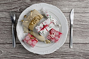 Dinner Setting with Gift. Suprize eating or gift dinner concept