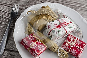 Dinner Setting with Gift. Suprize eating or gift dinner concept