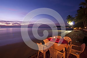 Dinner on sunset at beach in Thailand