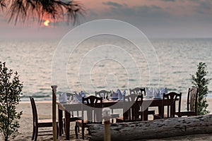 Dinner table set on the beach