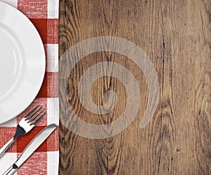 Dinner table with setting plate and cutlery top