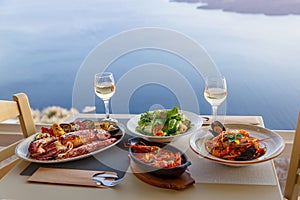 Dinner for two in a restaurant overlooking the sea