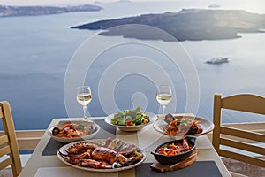 Dinner for two in a restaurant overlooking the sea