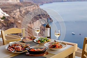 Dinner for two in a restaurant overlooking the sea