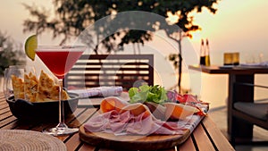 Dinner for two and the sea sunset on paradise Phuket island, Thailand, Asia. Romantic dinner with served fine dining