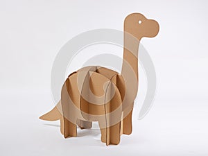 Dinosaur Brontosaurus made of cardboard. Idea for the birthday party, dino party or photo session