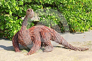 Dinosaur made of dry twigs