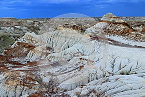 Dinosaur Provincial Park, UNESCO World Heritage Site, Thunderstorm behind Badlands Erosion at Valley of the Moon, Alberta, Canada