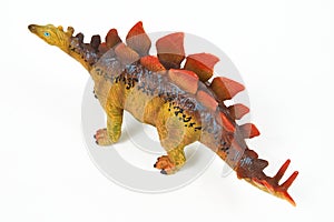 Dinosaur rubber toy isolated on white