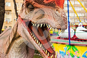 Dinosaur statue in the playground