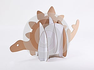 Dinosaur Stegosaurus made of cardboard. Idea for the birthday party, dino party or photo session