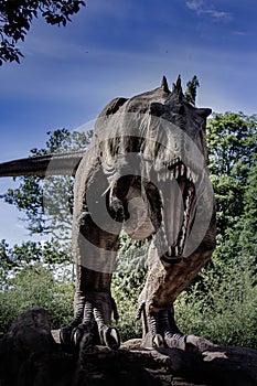 Dinosaur T Rex opens his jaw