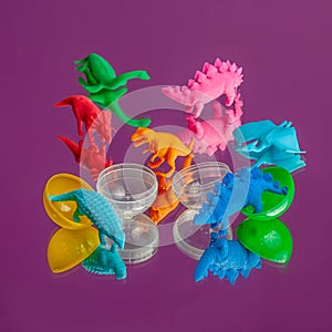 Dinosaur toy on colored background, Minaiture dinosaur model