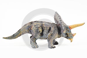 Dinosaur triceratops rubber toy isolated on white