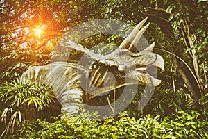 Dinosaurs fighting during the end of earth