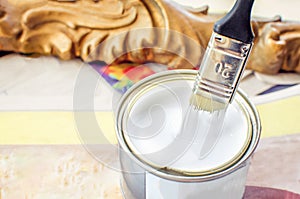 Dip brush white paint closeup