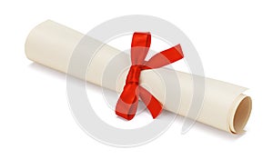 Diploma, scroll of paper with red bow isolated on white background