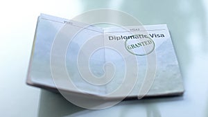 Diplomatic visa granted, seal stamped in passport, customs office, travelling