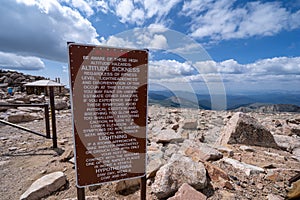 Dire warning sign of lightning strikes and altitude sickness at the summit of Mt. Evans Scenic Byway in Colorado