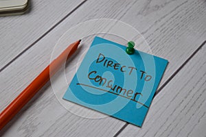 Direct To Consumer - DTC text on sticky notes isolated on office desk