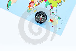 Direction of movement, travel direction. Compass and map on white background top view copy space