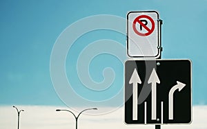 Direction & No Parking sign
