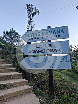 Direction sign for climbing Little Adams Peak. Vertical. Ella, Sri Lanka