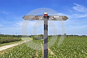 Direction sign Pieterpad walking route in countryside photo