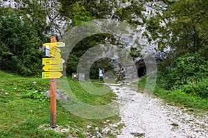 Direction sign show to the path to Fortress Kluze and Fort Hermann. World War I Fortress near Mount Rombon. Bovec, Gorizia,