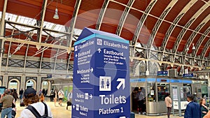 Direction sign to Elizabeth Line at Paddington station - LONDON, UK - JUNE 9, 2022