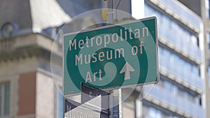 Direction sign to Metropolitan Museum in Manhattan - street photography