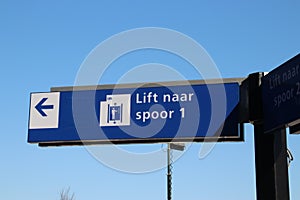 Direction sign to platform 1 by elevator on platform on the brand new train station Zoetermeer-Lansingerland