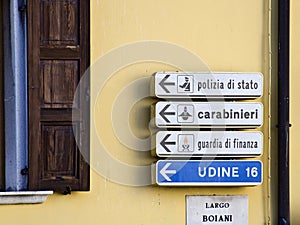 Direction sign to police departments