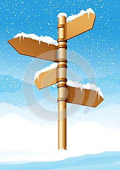 Direction sign in winter forest