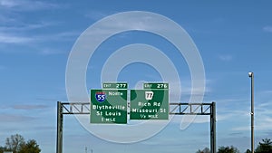 Direction signs on the highway to Blytheville and St Louis on Interstate 55 - POV driving by