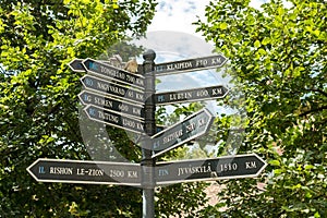 Direction Signs Indicate Distances To Different Cities