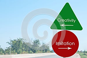Direction sIgns with words Creativity and Imitation outdoors, space for text. Plagiarism concept