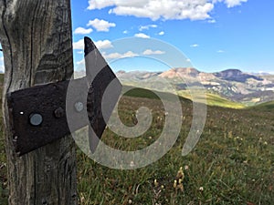 Directional arrow on alpine trail