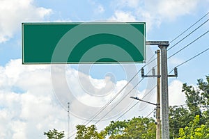 Directional green blank empty road sign in Tulum Mexico