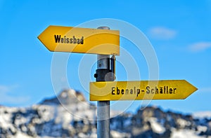 Directional signs pointing in opposite directions