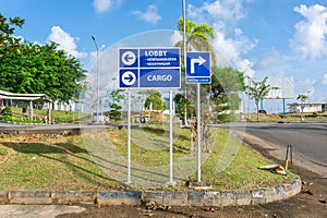 directional symbols labeled departure and arrival lobbies and cargo building